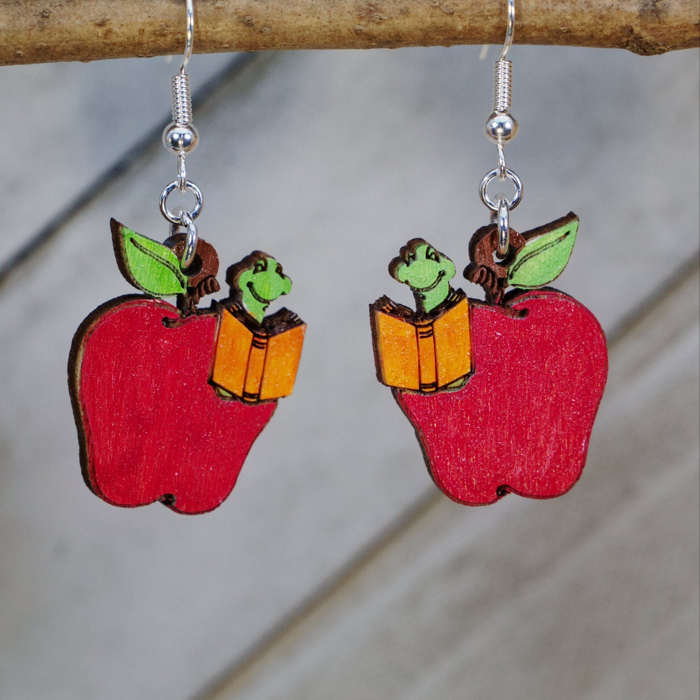 Hand-painted wooden apple with bookworm dangle earrings with playful classroom design and hypoallergenic sterling silver hooks, lightweight teacher jewelry gift for educators, librarians, and book lovers