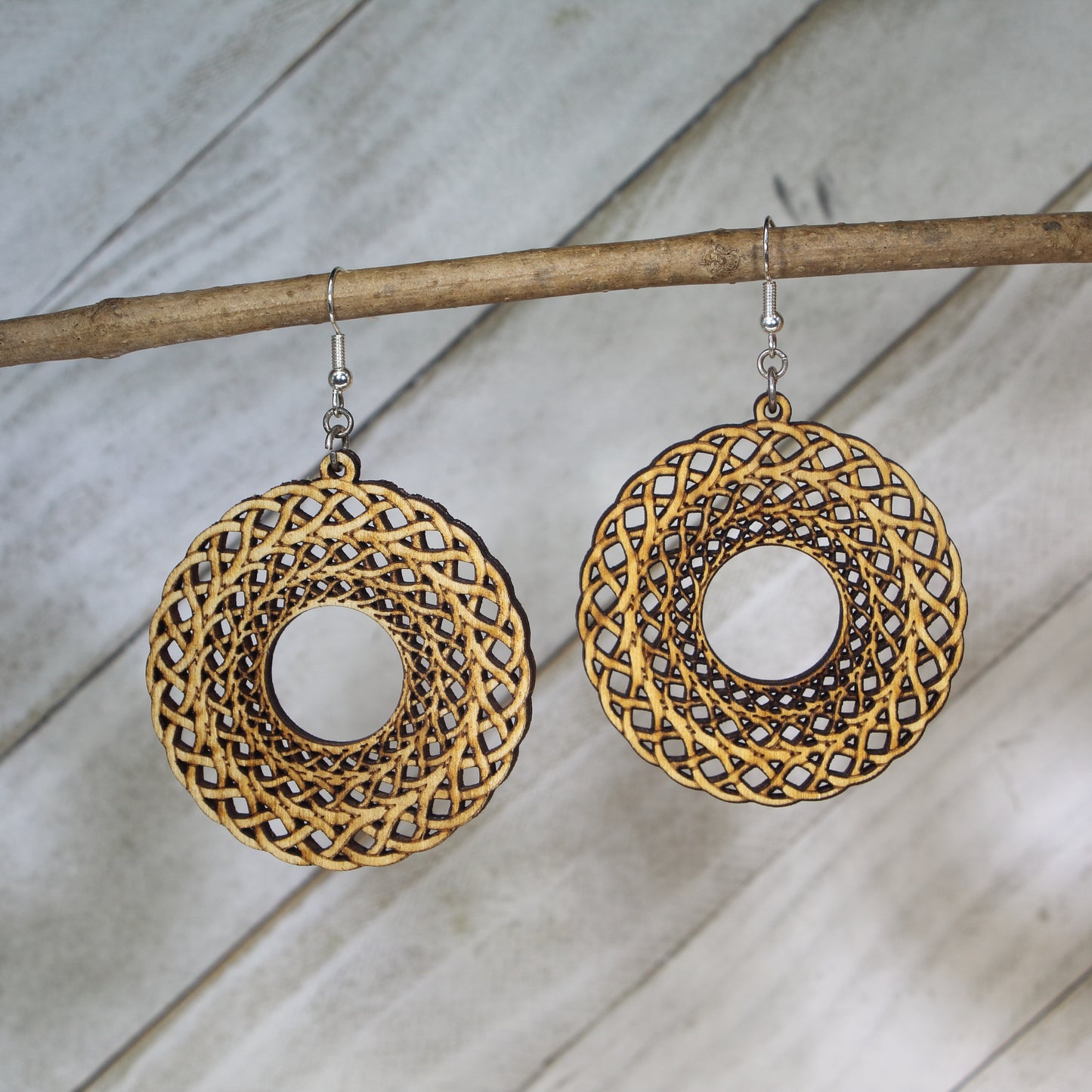 Hand-painted wooden Celtic knot circle dangle earrings with traditional Irish symbol design and hypoallergenic sterling silver hooks, lightweight heritage jewelry for Celtic culture lovers and timeless style by Cate’s Concepts