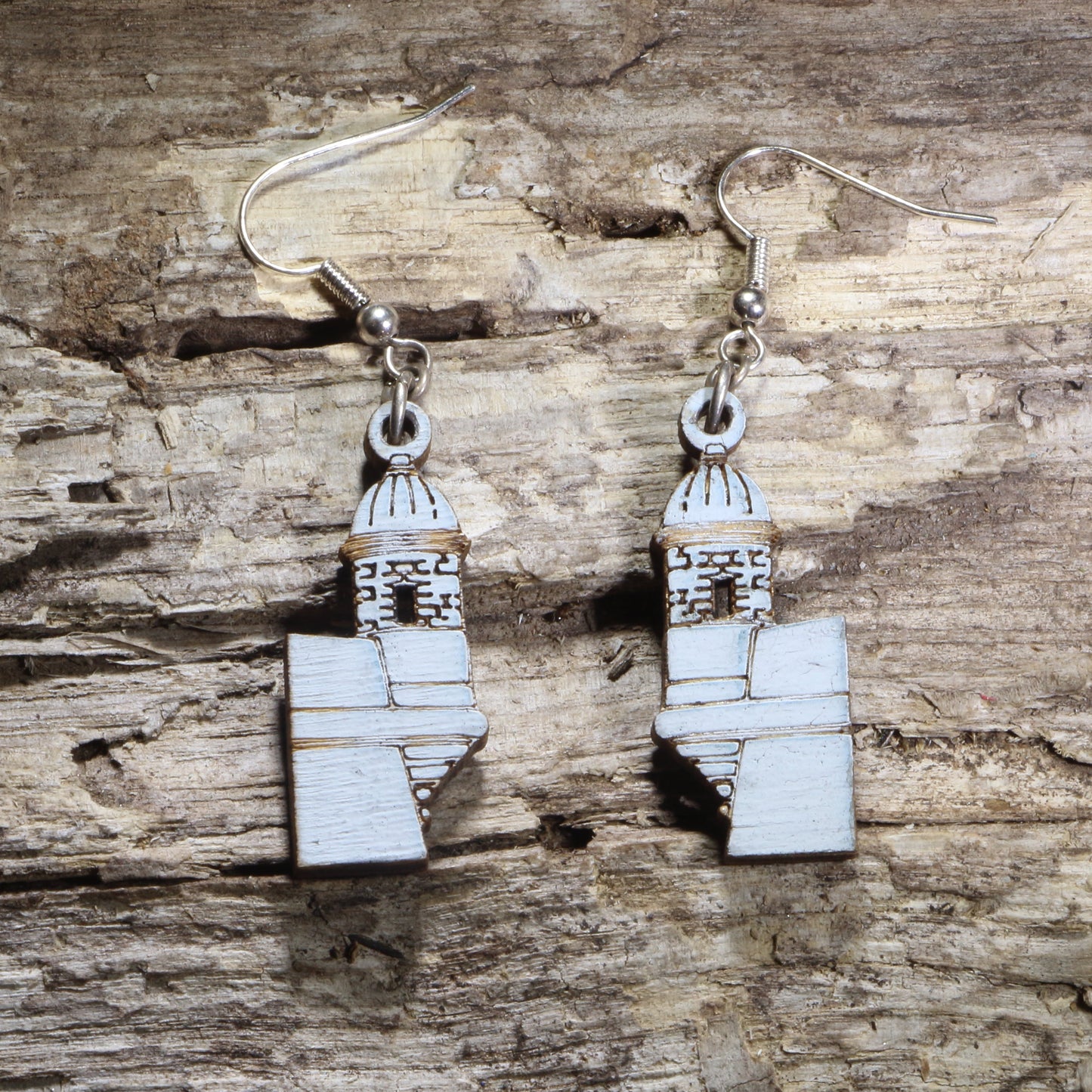 Handcrafted El Morro wooden dangle earrings featuring the iconic Castillo San Felipe del Morro fortress in Puerto Rico. Lightweight laser-cut wooden earrings with hypoallergenic .925 sterling silver hooks, perfect for Puerto Rican pride, Boricua heritage, Caribbean travel lovers, historic landmark enthusiasts, and unique cultural jewelry.