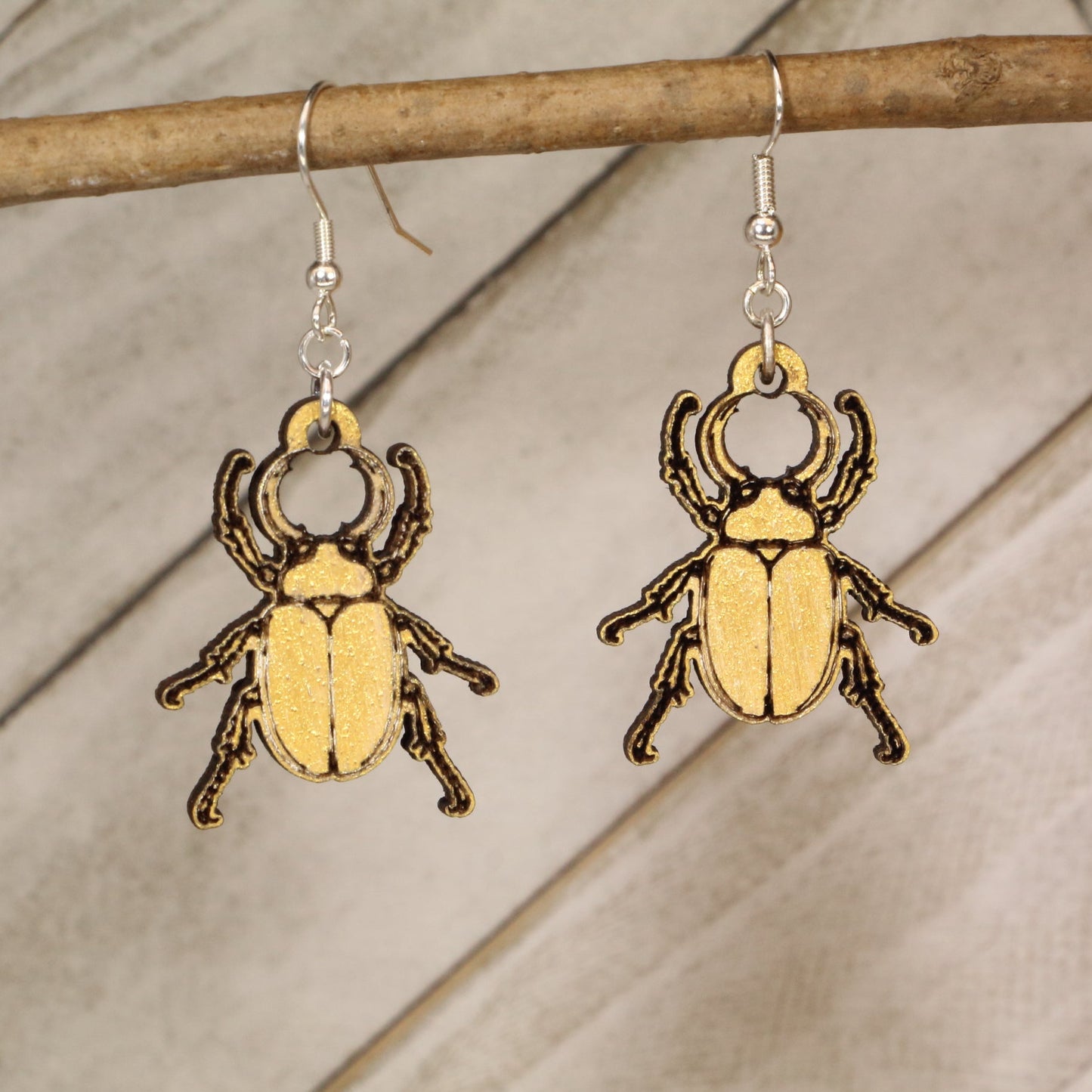 Hand-painted scarab beetle wooden dangle earrings, lightweight hypoallergenic nature insect jewelry with Egyptian-inspired design for boho style, spiritual symbolism, and unique statement looks