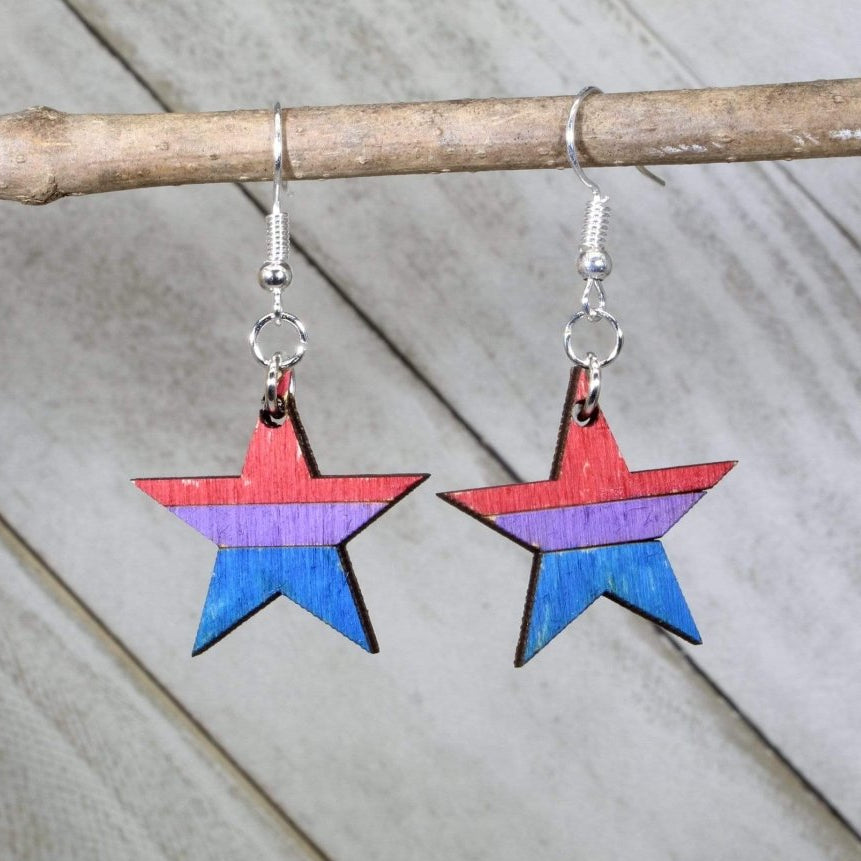 Hand-painted wooden bisexual pride star dangle earrings with bold bi flag color design and hypoallergenic sterling silver hooks, lightweight LGBTQ statement jewelry earrings for pride events and everyday inclusive style