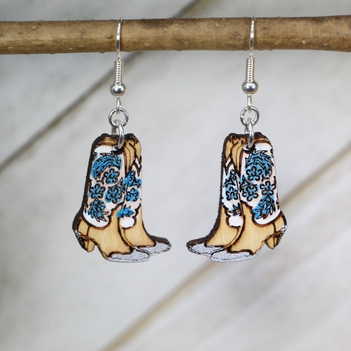 Hand-painted wooden cowboy boot dangle earrings with classic western design and hypoallergenic sterling silver hooks, rustic country statement jewelry earrings for rodeo and cowgirl style