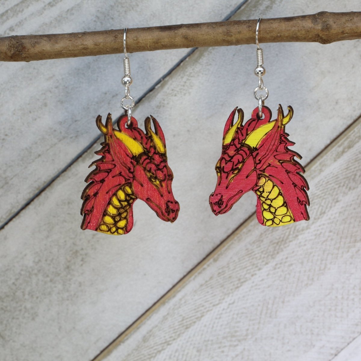 Red Hand-painted wooden fantasy dragon dangle earrings with detailed mythical creature design and hypoallergenic sterling silver hooks, lightweight dragon statement jewelry earrings for fantasy lovers and magical style