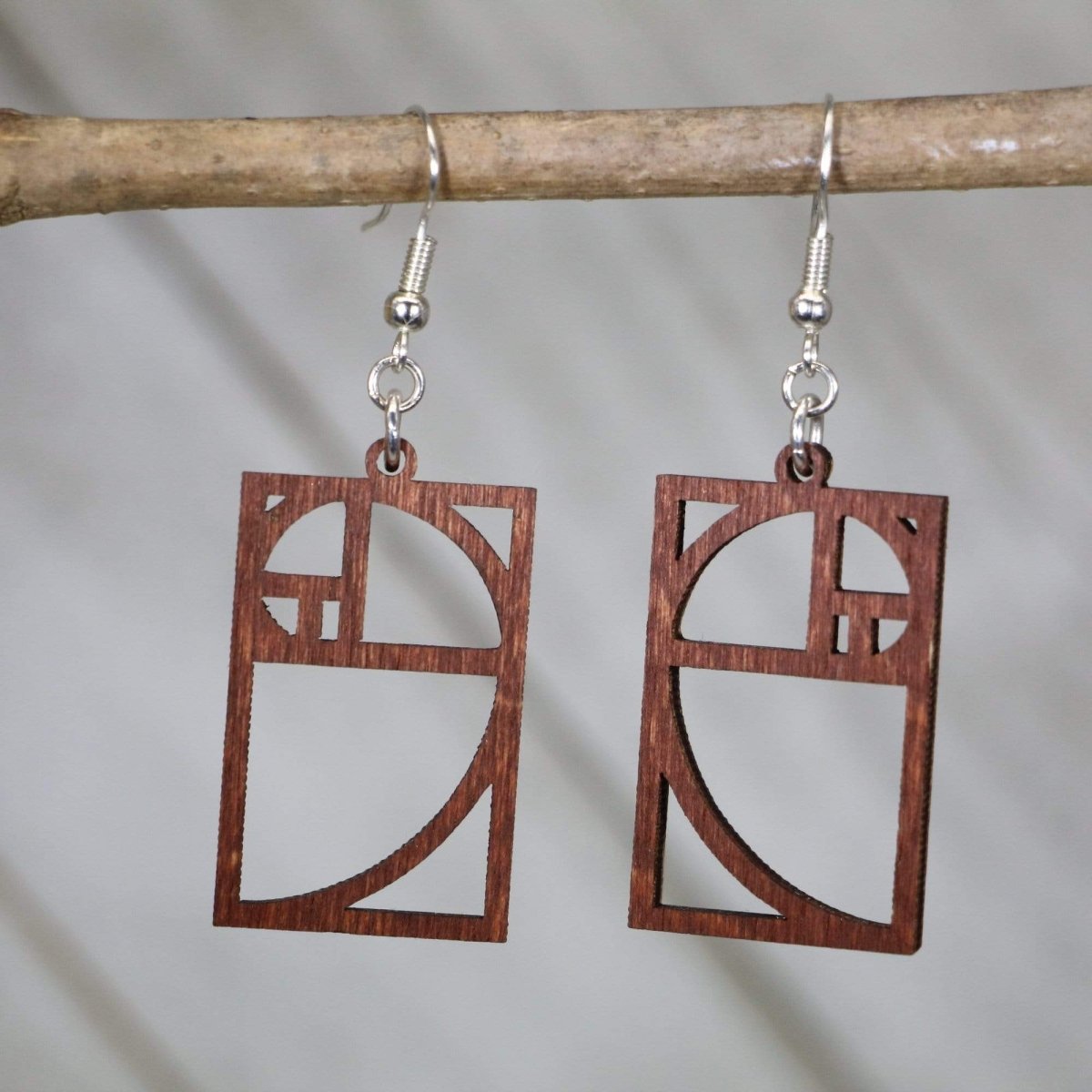 Hand-painted wooden Fibonacci spiral dangle earrings with golden ratio math design and hypoallergenic sterling silver hooks, lightweight STEM statement jewelry earrings for mathematicians, teachers, and science lovers