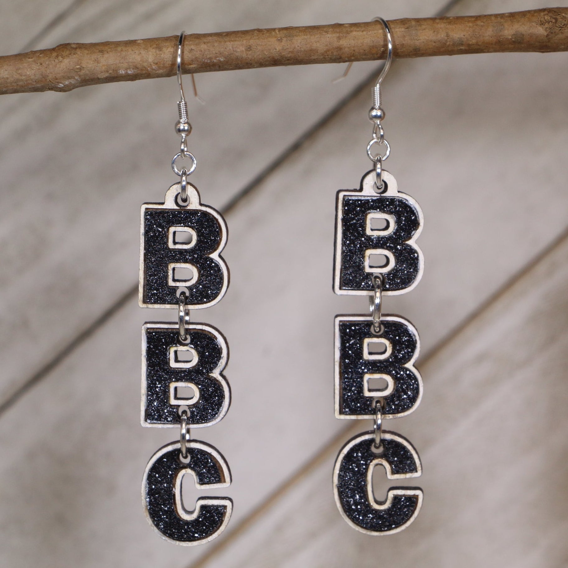 Hand-painted wooden “BBC” letter dangle earrings with bold block typography and hypoallergenic sterling silver hooks, cheeky adult humor novelty jewelry for parties, gag gifts, and edgy statement style