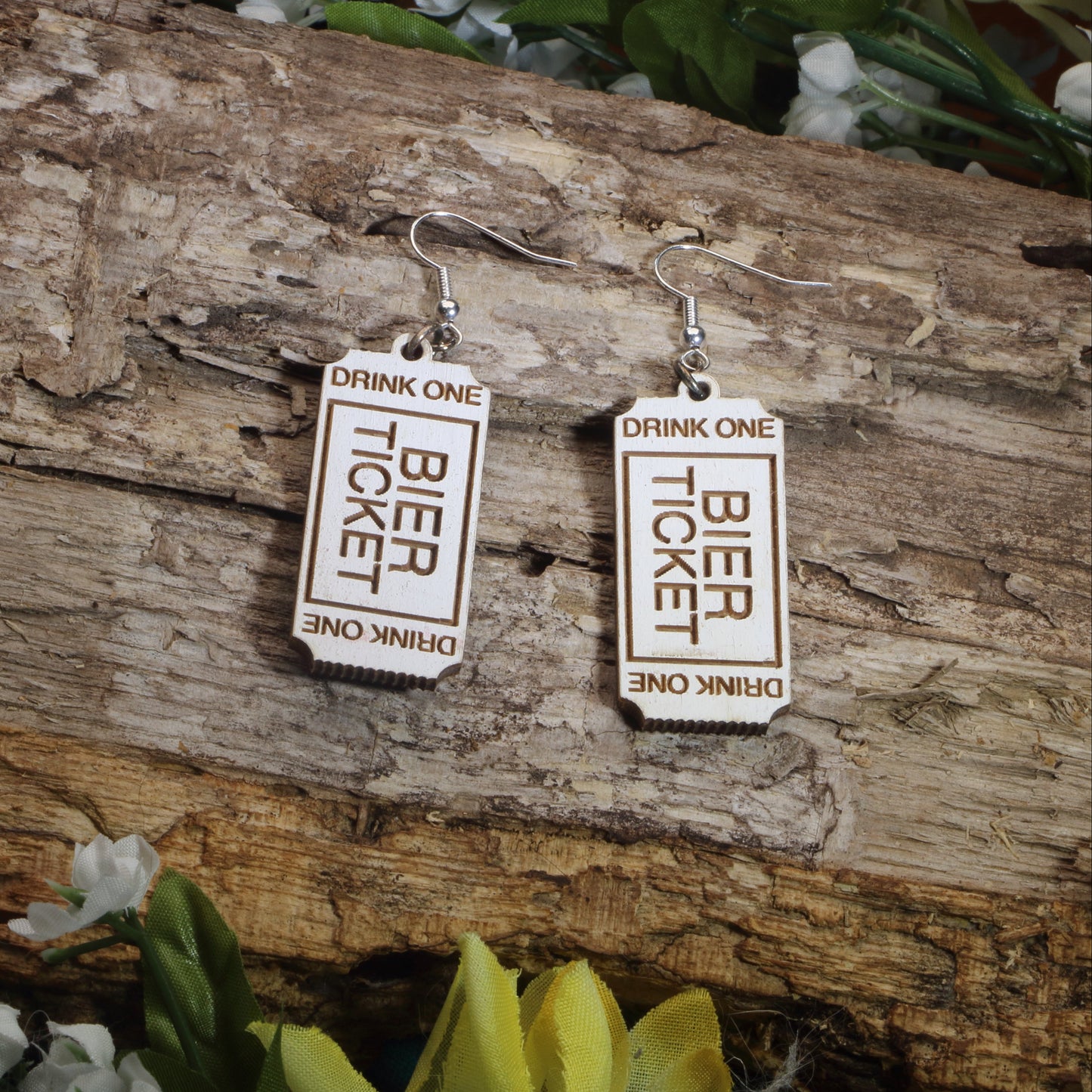 Hand-painted wooden beer ticket dangle earrings featuring a classic Oktoberfest drink ticket design, hypoallergenic sterling silver hooks, and lightweight novelty jewelry for beer lovers, festival goers, and German heritage celebrations by Cate’s Concepts.