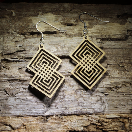 Intterlocking Double diamond geometric wooden dangle earrings featuring an intricate interlocking square pattern and natural wood finish. Lightweight statement jewelry perfect for geometric art lovers, modern style, and unique gifts.