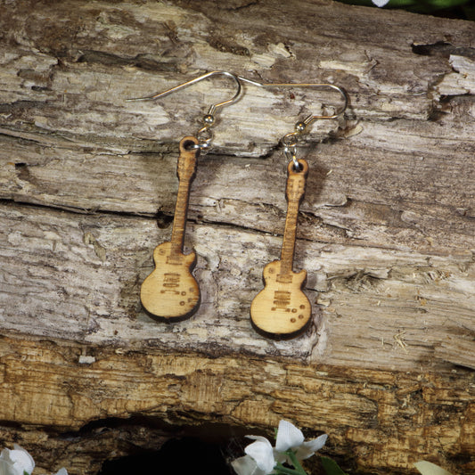 Hand-painted wooden electric guitar dangle earrings featuring detailed electric guitar silhouettes, hypoallergenic sterling silver hooks, and lightweight musician jewelry for guitar players, rock music fans, and band enthusiasts by Cate's Concepts.