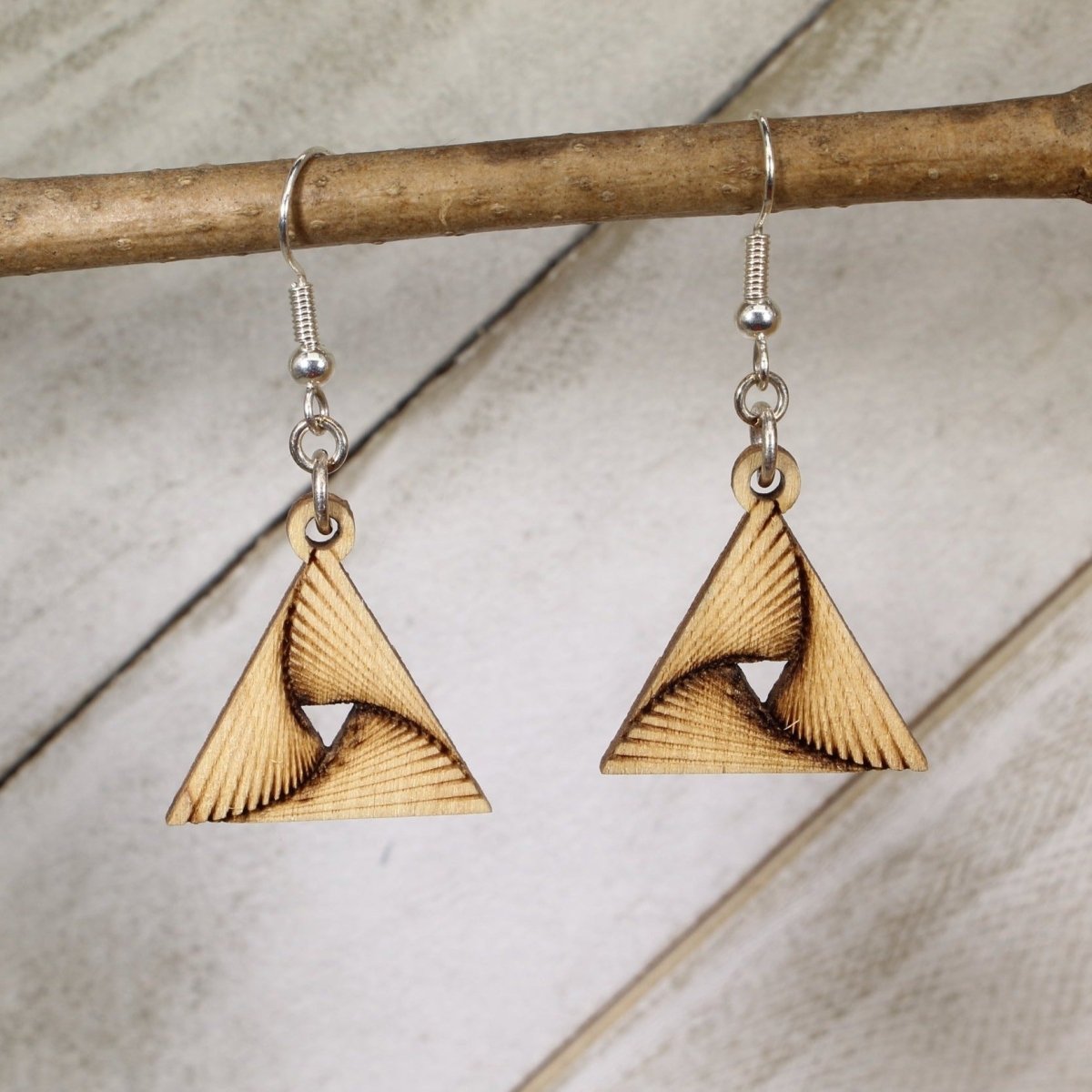 Hand-painted wooden geometric triangle twist dangle earrings featuring a modern layered triangle design with angular lines and hypoallergenic sterling silver hooks, lightweight jewelry for minimalist style lovers and contemporary fashion enthusiasts by Cate’s Concepts