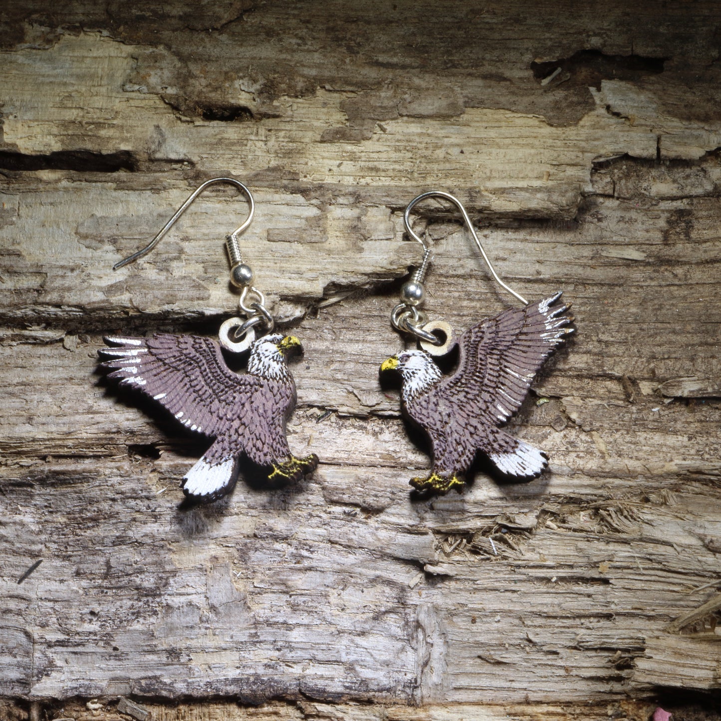 Hand-painted Bald Eagle wooden dangle earrings featuring the iconic American eagle in a lightweight wildlife design. Perfect for bird lovers, eagle enthusiasts, patriotic celebrations, veterans, and anyone who loves American wildlife jewelry.
