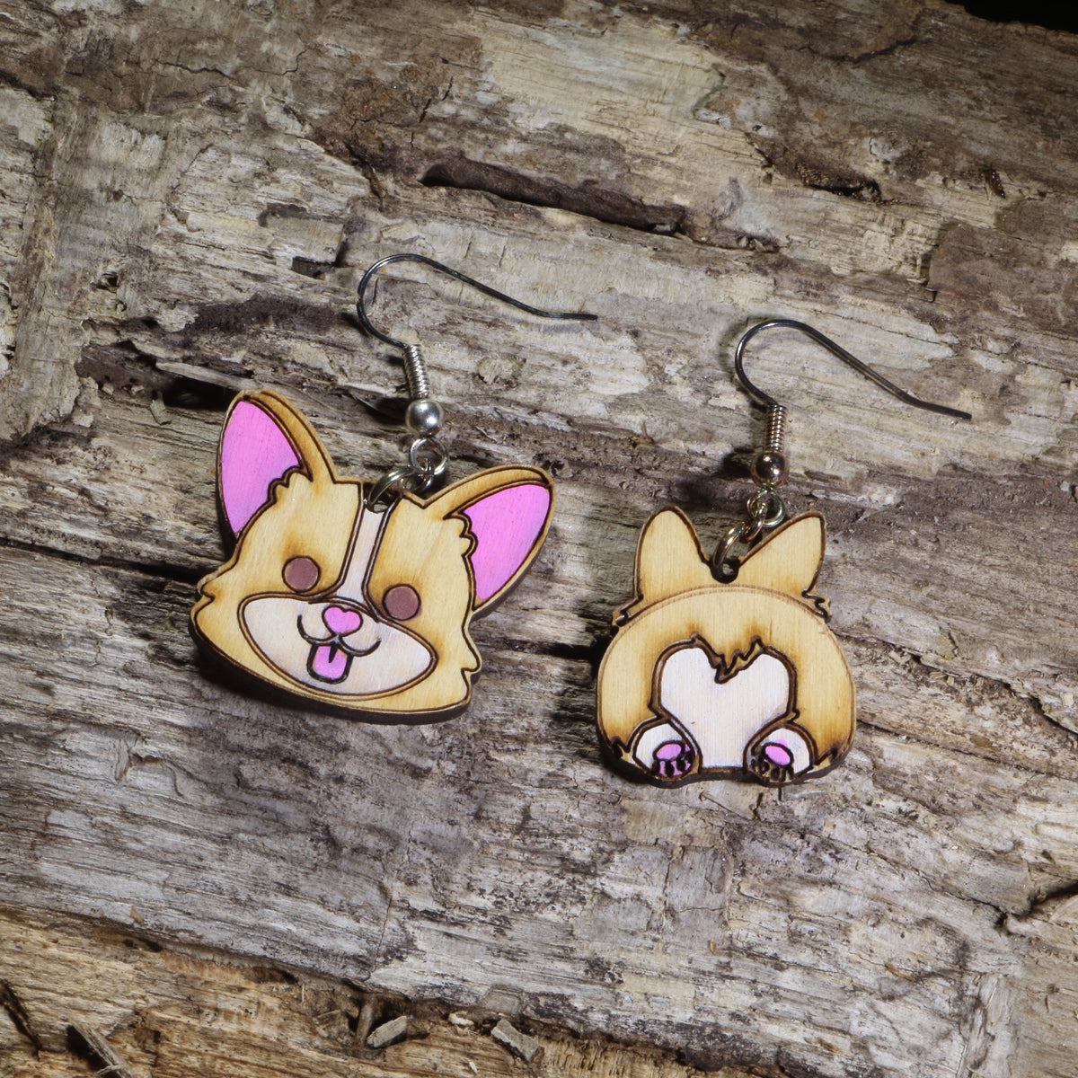 Hand-painted Corgi head and Corgi butt wooden mismatched dangle earrings on hypoallergenic .925 sterling silver hooks. Lightweight dog jewelry featuring an adorable Corgi face and heart-shaped Corgi rear, perfect for Corgi owners, dog lovers, and Welsh Corgi enthusiasts.