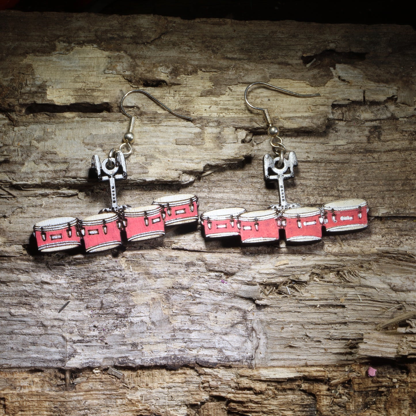 Hand-painted Marching Tenor Drums wooden dangle earrings featuring a colorful set of marching quads in a lightweight musical design. Perfect for tenor drummers, marching percussionists, drumline members, band directors, and marching band fans.