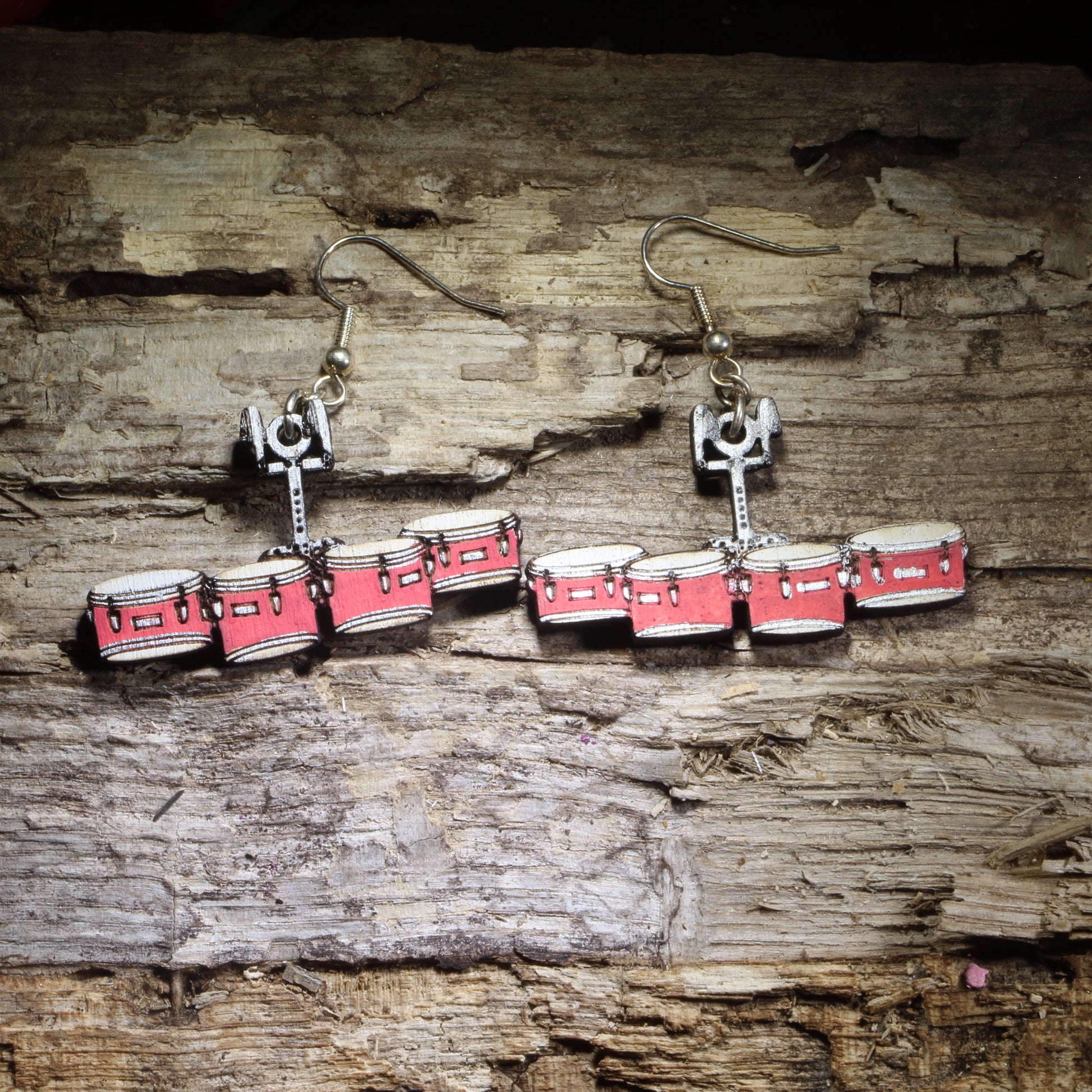 Hand-painted Marching Tenor Drums wooden dangle earrings featuring a colorful set of marching quads in a lightweight musical design. Perfect for tenor drummers, marching percussionists, drumline members, band directors, and marching band fans.