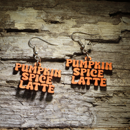 Hand-painted Pumpkin Spice Latte wooden dangle earrings featuring bold orange lettering for a fun autumn statement. Lightweight fall earrings perfect for PSL lovers, coffee fans, pumpkin spice season, and cozy fall outfits.