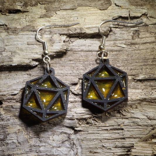 Hand-painted Resin D20 Dice wooden dangle earrings featuring the iconic 20-sided die with colorful resin accents. Lightweight and fun, they’re perfect for tabletop gamers, RPG players, dungeon masters, dice collectors, and game night adventures.
