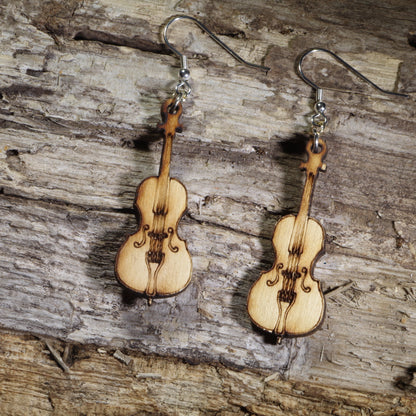 Hand-painted wooden cello dangle earrings with engraved strings and classic instrument details on hypoallergenic .925 sterling silver hooks. Lightweight orchestra jewelry perfect for cellists, string musicians, music teachers, and classical music lovers.