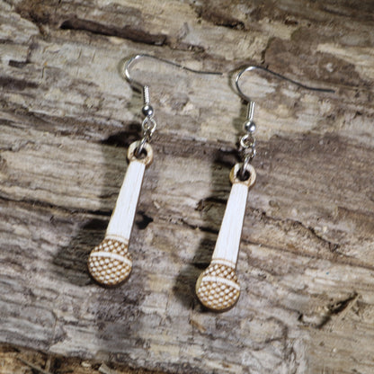 Hand-painted wooden handheld microphone dangle earrings with engraved microphone grille details on hypoallergenic .925 sterling silver hooks. Lightweight music jewelry perfect for singers, vocalists, karaoke enthusiasts, podcasters, and music lovers.