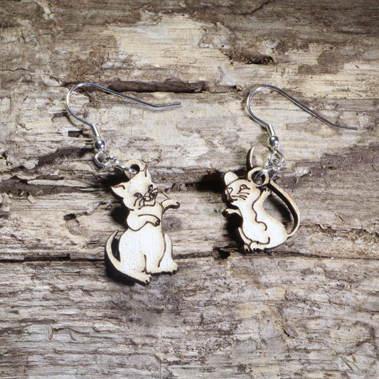 Hand-painted wooden mismatched cat and mouse dangle earrings featuring a playful white cat reaching toward a smiling mouse on hypoallergenic .925 sterling silver hooks. Lightweight animal jewelry for cat lovers, mouse enthusiasts, pet owners, and anyone who enjoys whimsical, playful accessories.