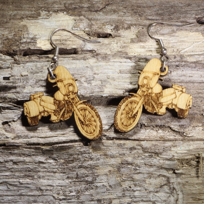Hand-painted wooden motorcycle trike dangle earrings featuring a detailed three-wheeled touring motorcycle design on hypoallergenic .925 sterling silver hooks. Lightweight biker-inspired jewelry for motorcycle riders, trike enthusiasts, road trip lovers, and touring bike fans.