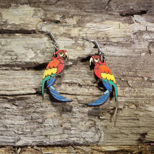 Hand-painted wooden parrot dangle earrings featuring colorful tropical parrots with red, orange, yellow, green, and blue feathers on hypoallergenic .925 sterling silver hooks. Lightweight bird jewelry perfect for parrot lovers, tropical wildlife enthusiasts, and colorful nature-inspired style.