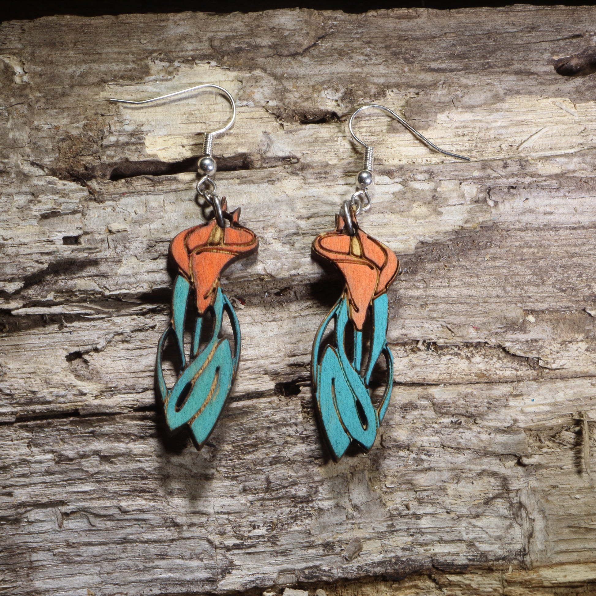 Handcrafted Art Nouveau Calla Lily wooden dangle earrings featuring elegant calla lilies with flowing organic Art Nouveau lines. Lightweight laser-cut wooden earrings with hypoallergenic .925 sterling silver hooks, perfect for flower lovers, botanical jewelry collectors, Art Nouveau enthusiasts, elegant floral fashion, and nature-inspired accessories.