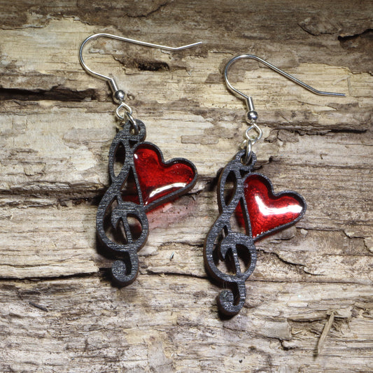 Handmade treble clef and Music Heart Resign Earrings Wooden | Treble Clef Jewelry featuring a glossy red resin heart accent on lightweight laser-cut wood with hypoallergenic .925 sterling silver hooks. Perfect music teacher earrings, choir gifts, band director jewelry, musician accessories, and Valentine's Day gifts for music lovers.