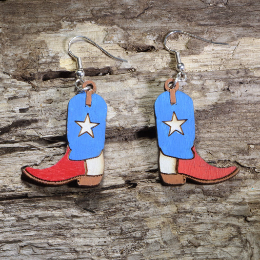 Handmade Texas Lone Star cowboy boot wooden dangle earrings featuring classic western boots with a bold Lone Star design. Lightweight Texas earrings crafted from wood with hypoallergenic .925 sterling silver hooks, perfect for Texas pride, western fashion, country music fans, rodeo enthusiasts, cowgirls, and unique cowboy jewelry collectors.