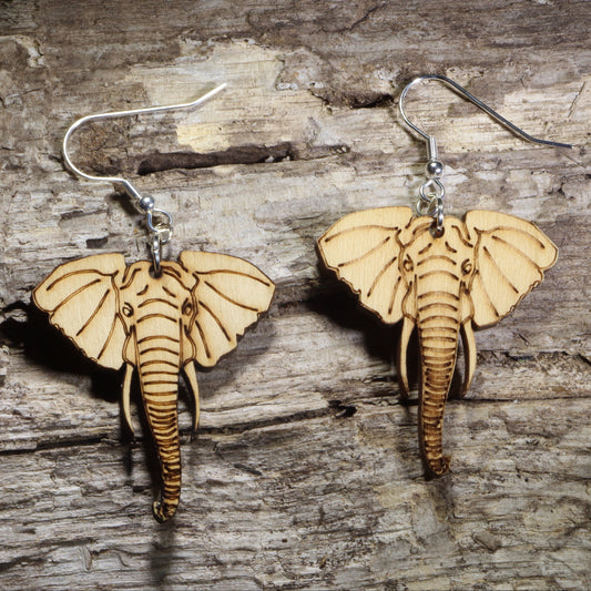 Handmade elephant wooden dangle earrings crafted from lightweight laser-cut wood with hypoallergenic .925 sterling silver hooks. African wildlife jewelry featuring a detailed elephant face, perfect for elephant lovers, safari enthusiasts, zoo supporters, nature lovers, and unique animal gifts.