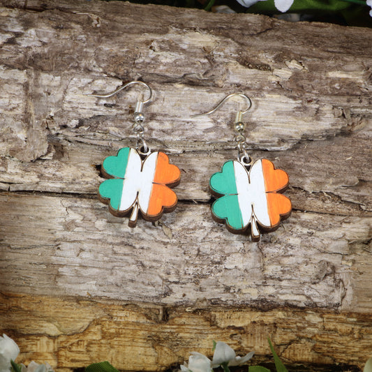 Hand-painted wooden Irish flag four leaf clover dangle earrings featuring a shamrock design in green, white, and orange, hypoallergenic sterling silver hooks, and lightweight St. Patrick’s Day jewelry for Irish pride celebrations by Cate's Concepts.