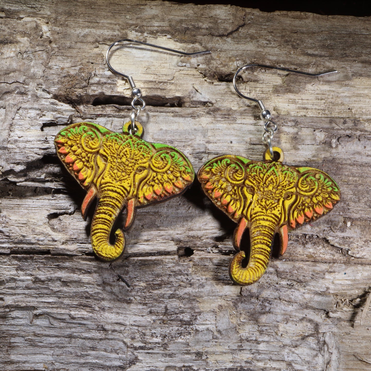 Hand-painted mandala elephant wooden dangle earrings featuring an intricate boho elephant design on lightweight wood with hypoallergenic .925 sterling silver hooks. Perfect for elephant lovers, bohemian jewelry fans, yoga enthusiasts, wildlife lovers, and unique nature-inspired accessories.