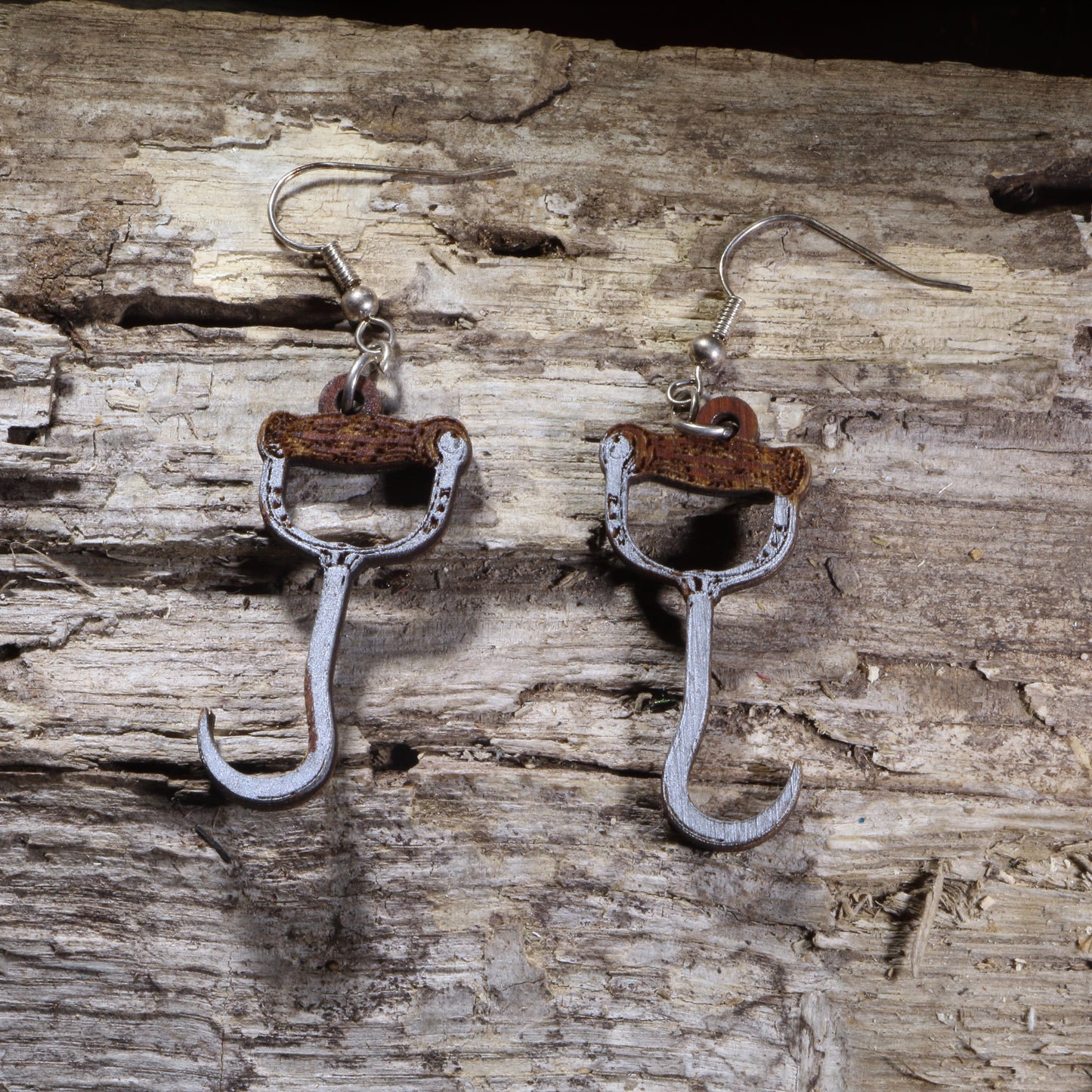 Handcrafted Meat Hook wooden dangle earrings featuring realistic butcher meat hooks inspired by butcher shops, barbecue, and culinary tools. Lightweight laser-cut wooden earrings with hypoallergenic .925 sterling silver hooks, perfect for butchers, chefs, barbecue enthusiasts, meat lovers, hunters, and fans of unique novelty jewelry.