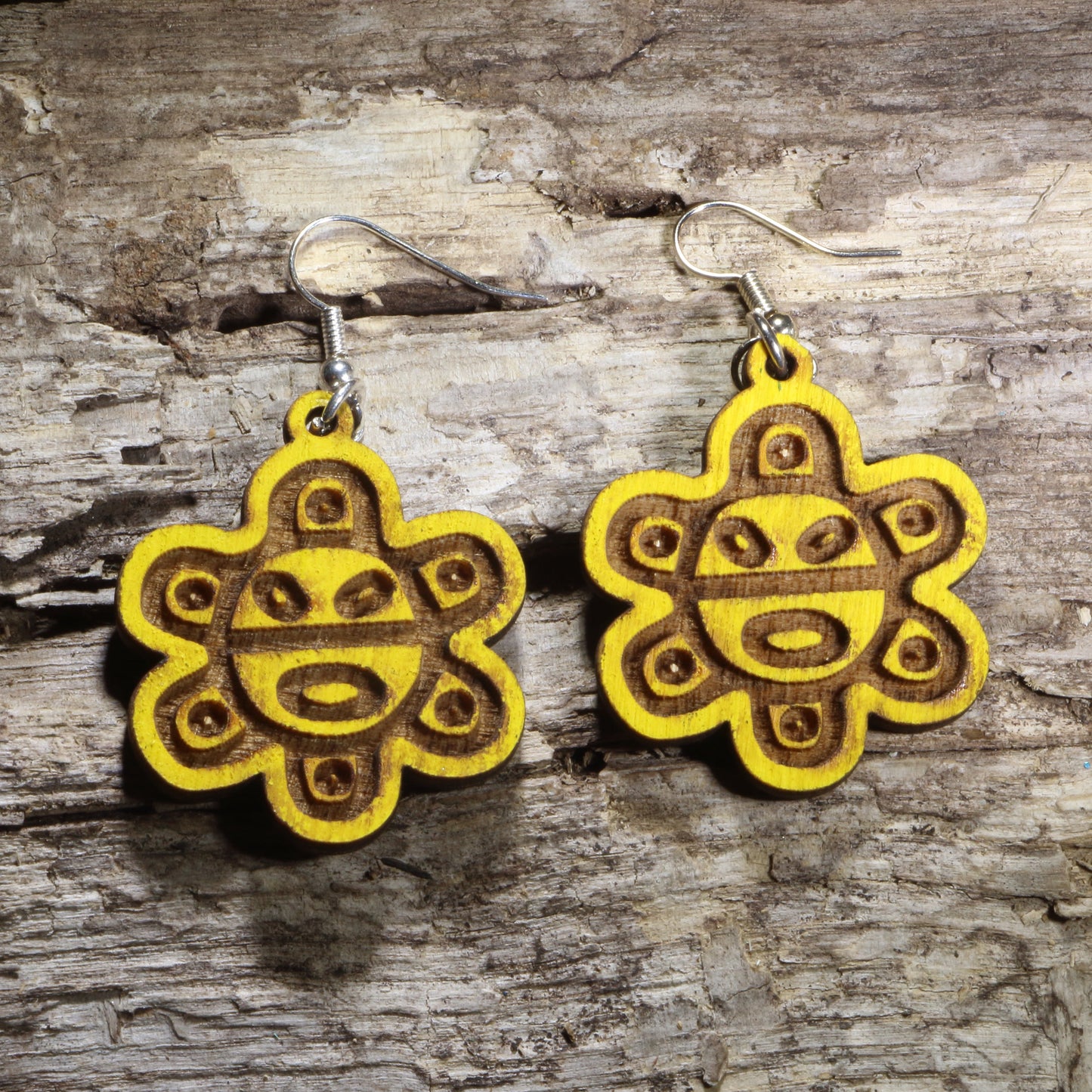 Hand-painted wooden Puerto Rican Taíno sun symbol dangle earrings featuring the iconic yellow Taíno sun on hypoallergenic .925 sterling silver hooks. Lightweight Puerto Rico-inspired jewelry for Boricua pride, Caribbean culture, Taíno heritage, island travelers, and unique cultural gifts.