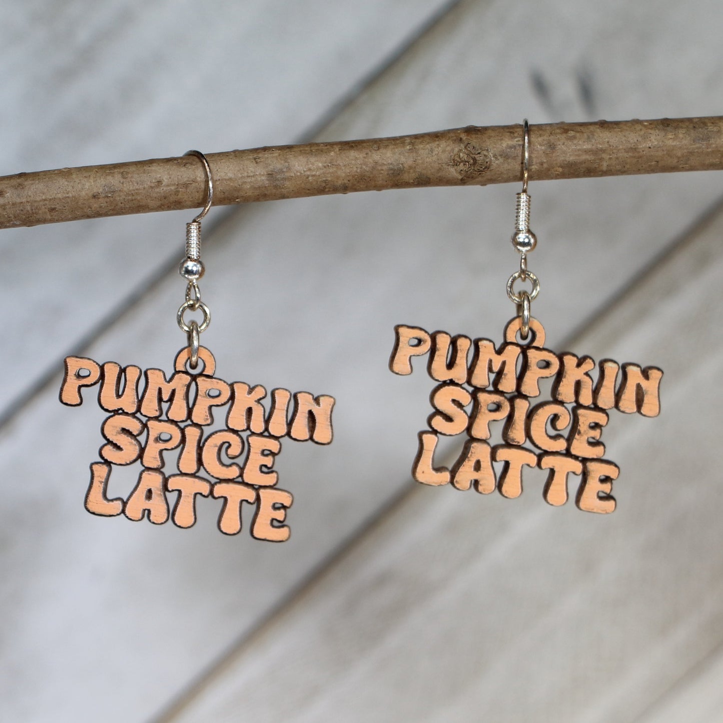 Hand-painted wooden pumpkin spice latte dangle earrings with cozy fall coffee design and hypoallergenic sterling silver hooks, lightweight autumn jewelry for coffee lovers and seasonal style by Cate’s Concepts
