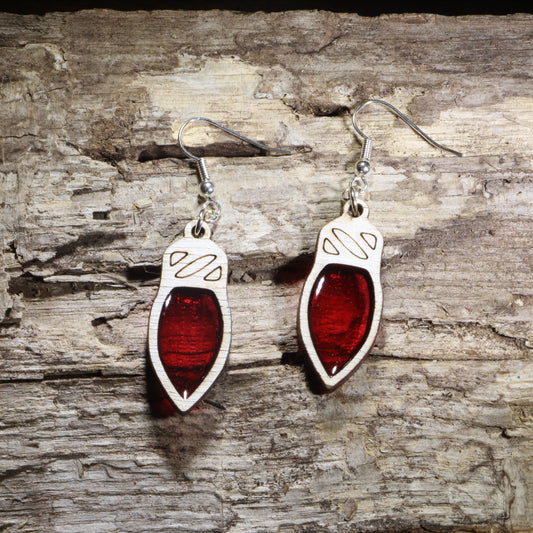 Handcrafted red resin Christmas light wooden dangle earrings featuring colorful holiday light bulbs with glossy resin-filled centers. Lightweight laser-cut wooden earrings with hypoallergenic .925 sterling silver hooks, perfect for Christmas celebrations, holiday parties, festive fashion, Christmas light lovers, and seasonal handmade jewelry.