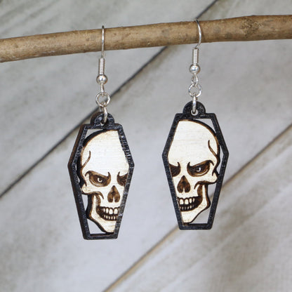 Hand-painted skull coffin wooden dangle earrings with gothic horror design, lightweight hypoallergenic spooky jewelry for Halloween lovers and dark fantasy fans