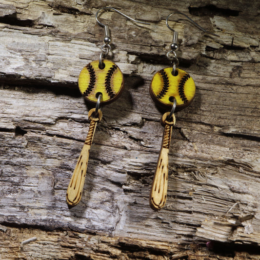 Hand-painted wooden softball and bat dangle earrings on hypoallergenic .925 sterling silver hooks. Lightweight softball jewelry for players, coaches, team moms, tournament weekends, game days, and sports fans.