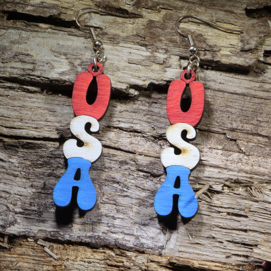 Hand-painted USA-shaped wooden dangle earrings on hypoallergenic .925 sterling silver hooks. Lightweight patriotic American jewelry perfect for Independence Day, Memorial Day, Veterans Day, military families, and proud Americans.