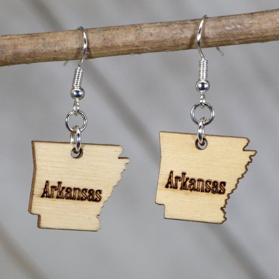 Hand-painted wooden Arkansas state dangle earrings featuring a state-shaped design with clean outline and regional detailing and hypoallergenic sterling silver hooks, lightweight jewelry for Arkansas locals and state pride enthusiasts by Cate’s Concepts
