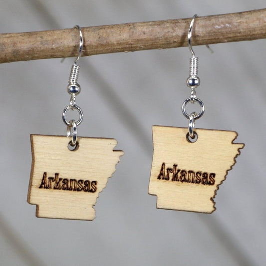 Hand-painted wooden Arkansas state dangle earrings featuring a state-shaped design with clean outline and regional detailing and hypoallergenic sterling silver hooks, lightweight jewelry for Arkansas locals and state pride enthusiasts by Cate’s Concepts

