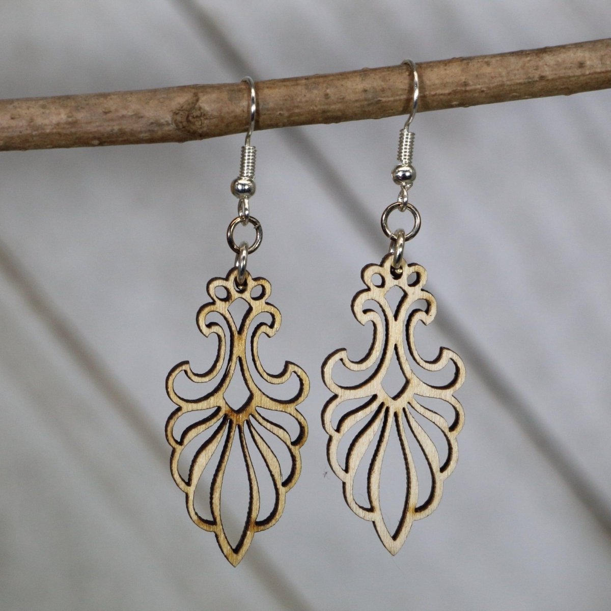 Hand-painted wooden Art Deco floral chandelier dangle earrings featuring an elegant vintage design with geometric lines and floral accents and hypoallergenic sterling silver hooks, lightweight jewelry for vintage lovers and Art Deco enthusiasts by Cate’s Concepts