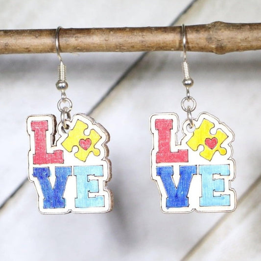Hand-painted wooden autism love dangle earrings with colorful awareness design and hypoallergenic sterling silver hooks, lightweight autism statement jewelry earrings for advocacy, support, and meaningful style
