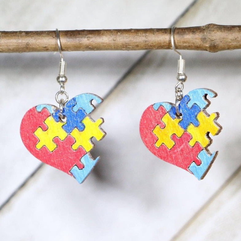 Hand-painted wooden autism puzzle heart dangle earrings with colorful awareness design and hypoallergenic sterling silver hooks, lightweight autism statement jewelry earrings for advocacy, support, and meaningful everyday style