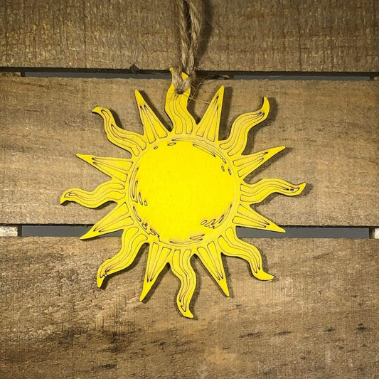 Hand-painted wooden bohemian sun Christmas ornament with celestial holiday design and lightweight festive decor, radiant sun tree decoration for boho winter and cosmic holiday style