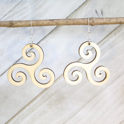 and-painted wooden Celtic triskele dangle earrings with traditional Irish spiral symbol design and hypoallergenic sterling silver hooks, lightweight triskele statement jewelry earrings for Celtic heritage and spiritual style