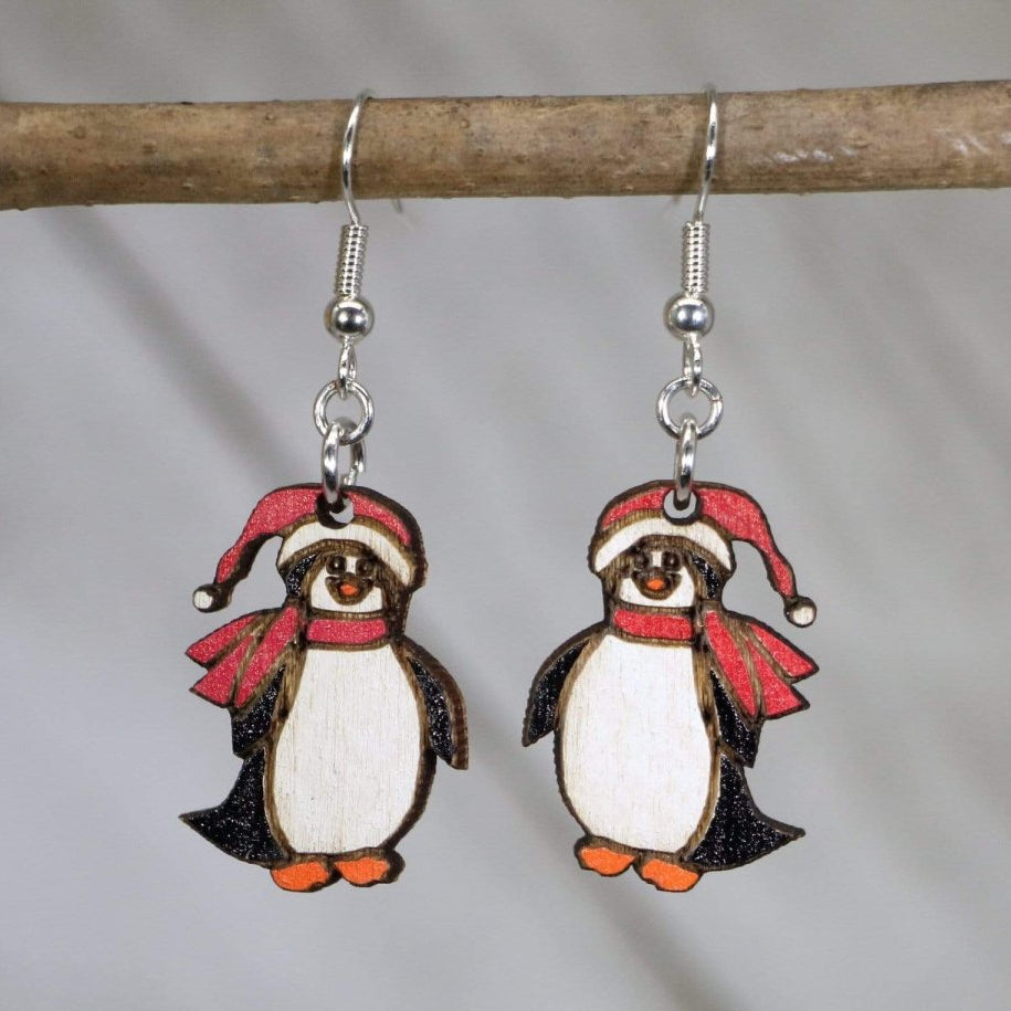 Hand-painted wooden Christmas penguin dangle earrings with cute winter holiday design and hypoallergenic sterling silver hooks, lightweight penguin statement jewelry earrings for festive style
