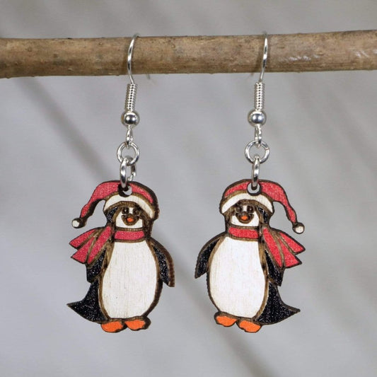 Hand-painted wooden Christmas penguin dangle earrings with cute winter holiday design and hypoallergenic sterling silver hooks, lightweight penguin statement jewelry earrings for festive style

