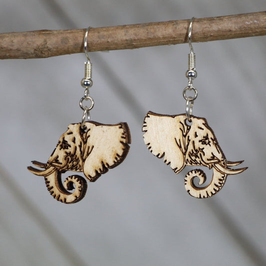 Hand-painted wooden elephant profile dangle earrings featuring a graceful side-view elephant design with curved trunk and detailed silhouette and hypoallergenic sterling silver hooks, lightweight jewelry for animal lovers and safari enthusiasts by Cate’s Concepts