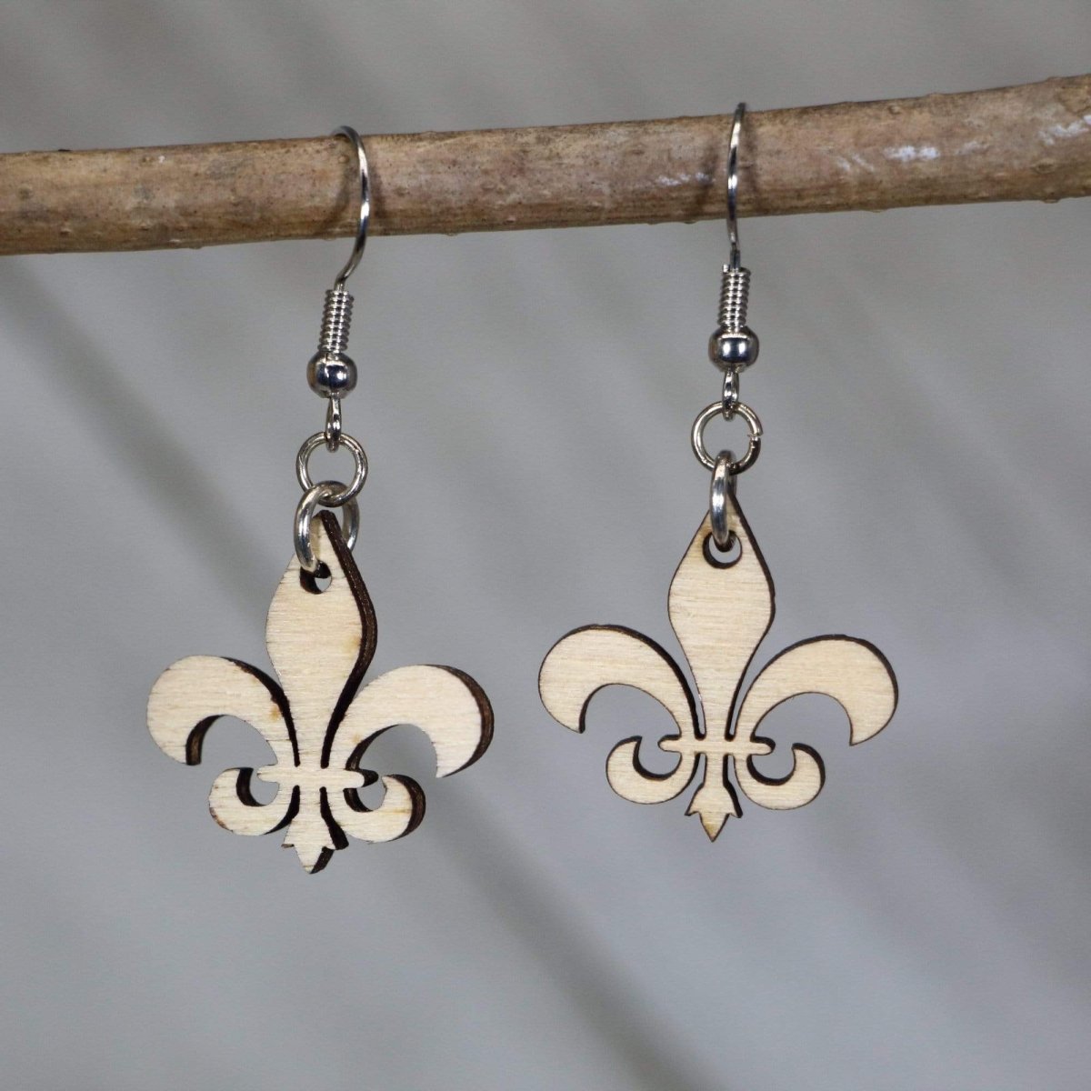 Hand-painted wooden fleur-de-lis dangle earrings with classic Louisiana state symbol design and hypoallergenic sterling silver hooks, lightweight fleur-de-lis statement jewelry earrings for New Orleans style