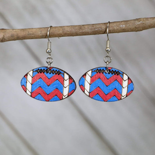 Hand-painted wooden football dangle earrings with chevron team spirit design and hypoallergenic sterling silver hooks, lightweight football statement jewelry earrings for players, fans, and football moms

