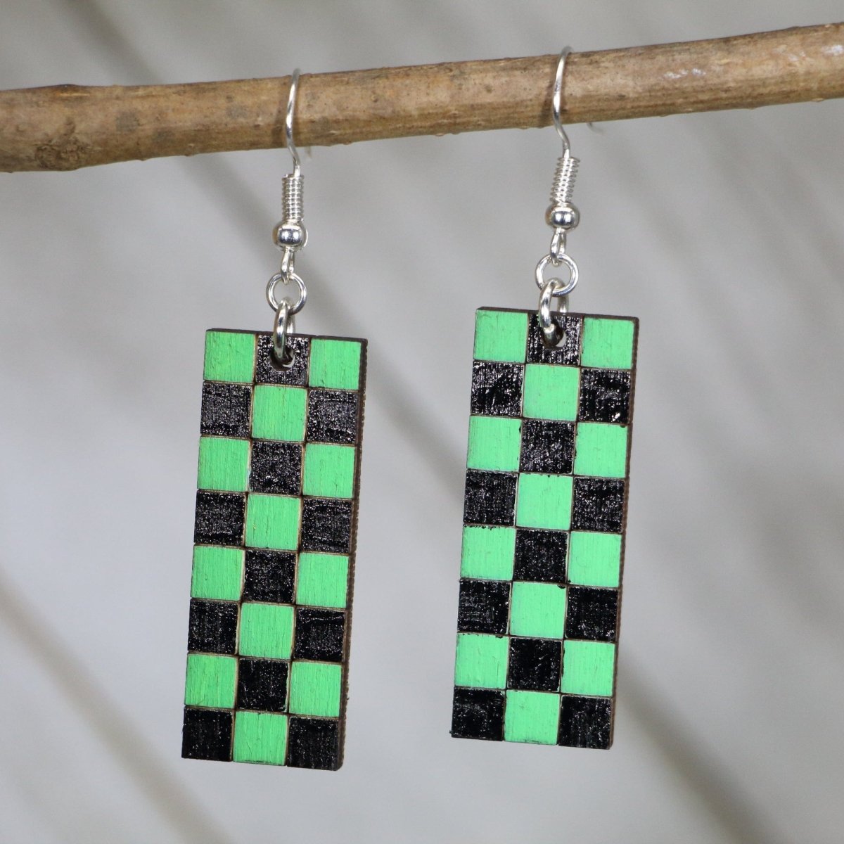 Hand-painted wooden green black checkerboard dangle earrings with pixel gaming design and hypoallergenic sterling silver hooks, lightweight checkerboard statement jewelry earrings for retro gamer style
